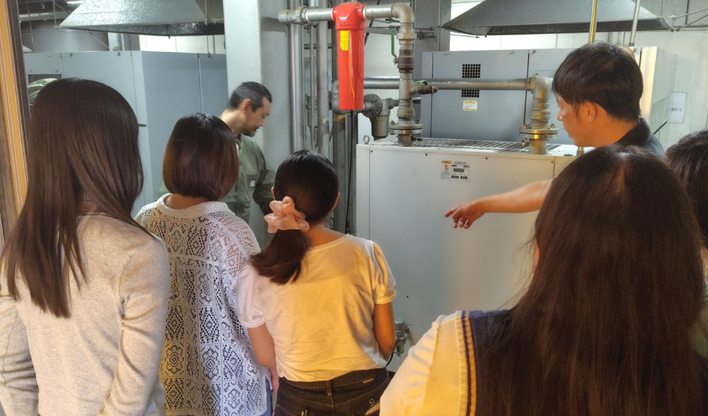 Scenes from classes at Tomiyasu Metal Printing headquarters factory